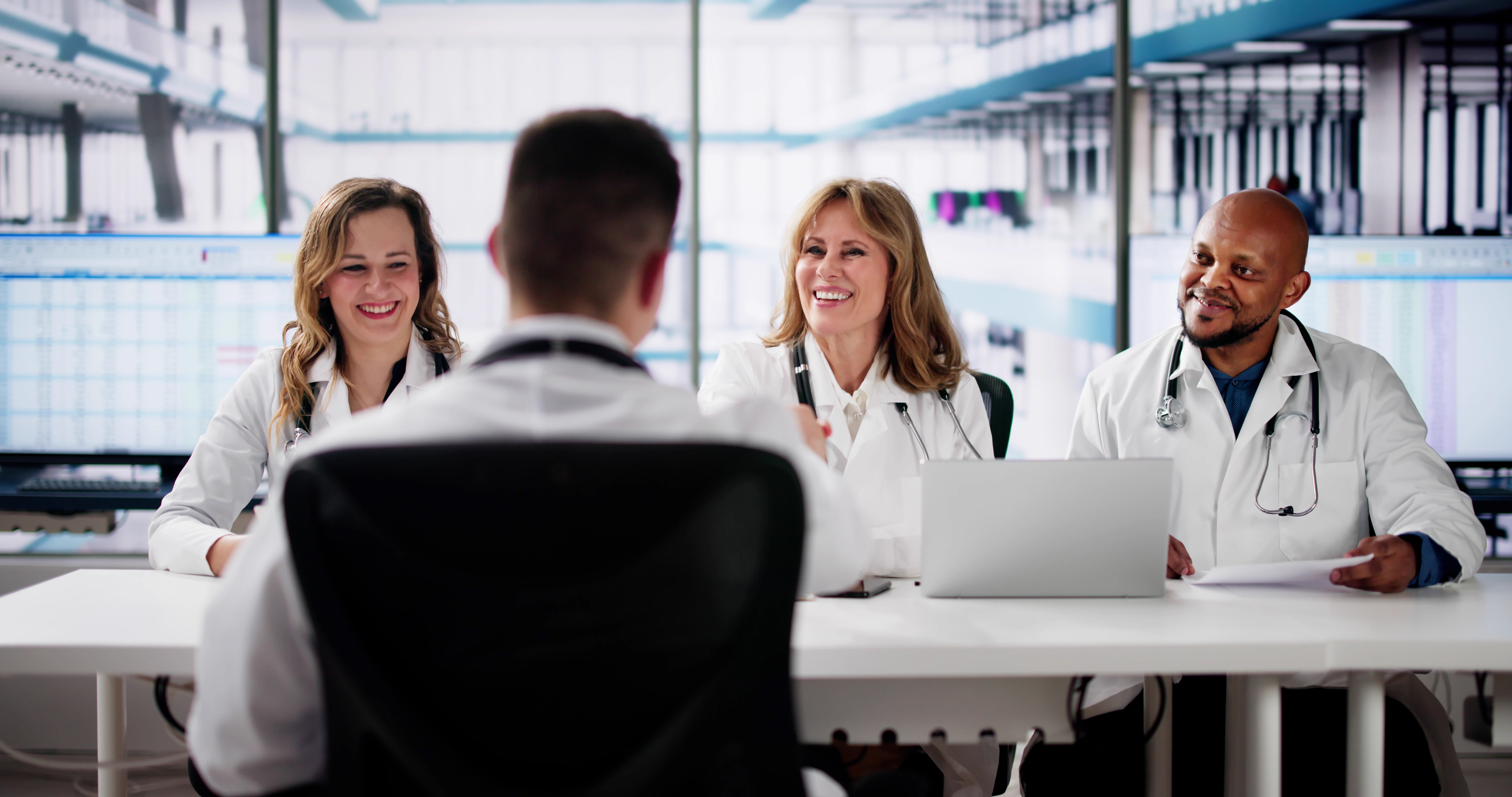 Staffing Interview In Hospital. Doctor Recruiter Meeting Handshake